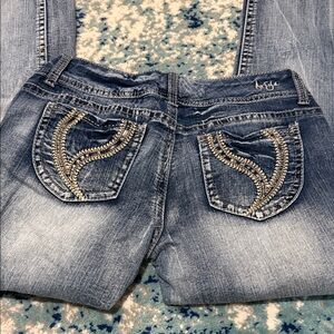 Ariya Women's Blue Boot Cut Jeans with Gold Pocket Embellishment